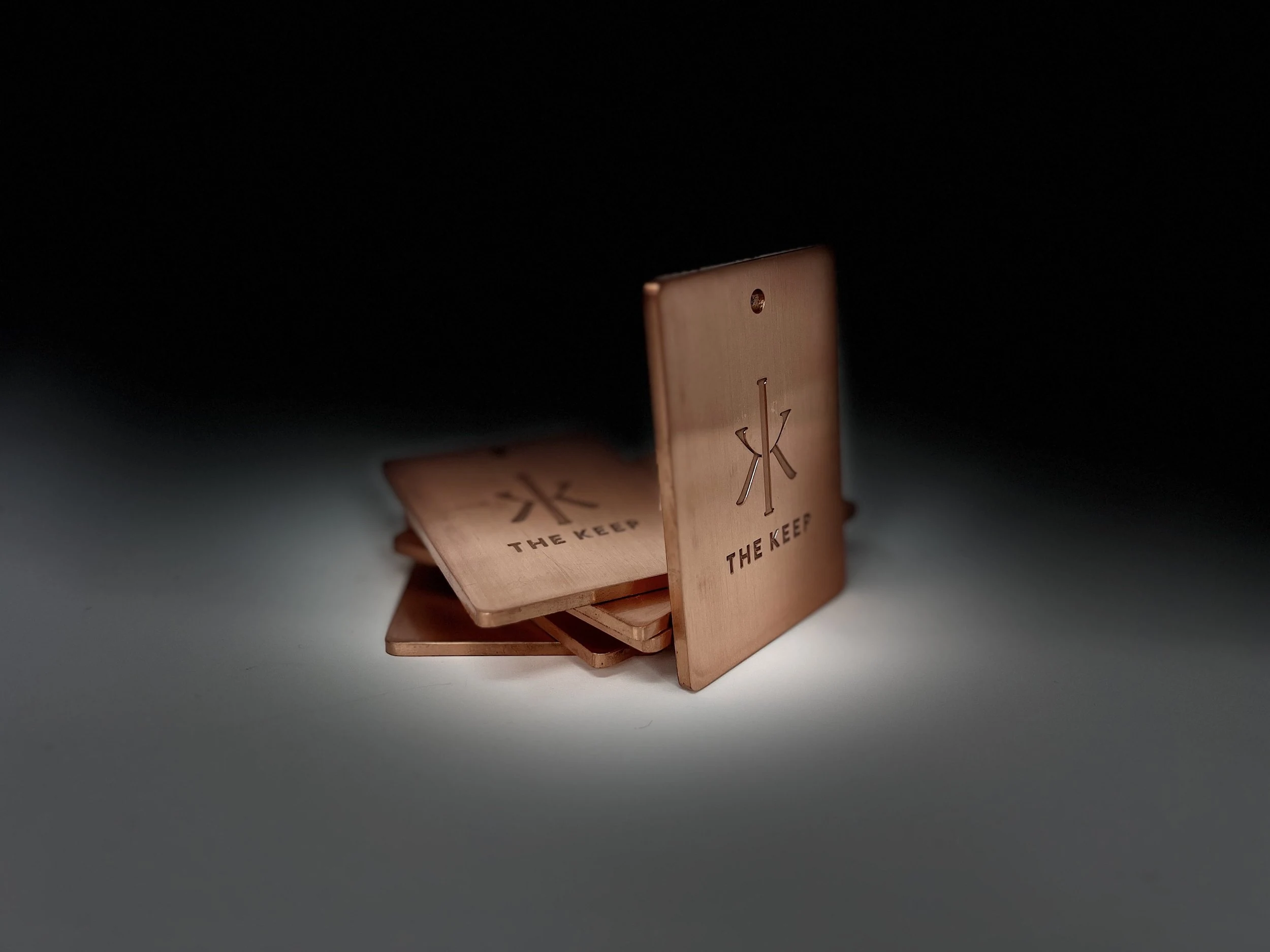 KEEP branded bag tag showing refined brand identity design details